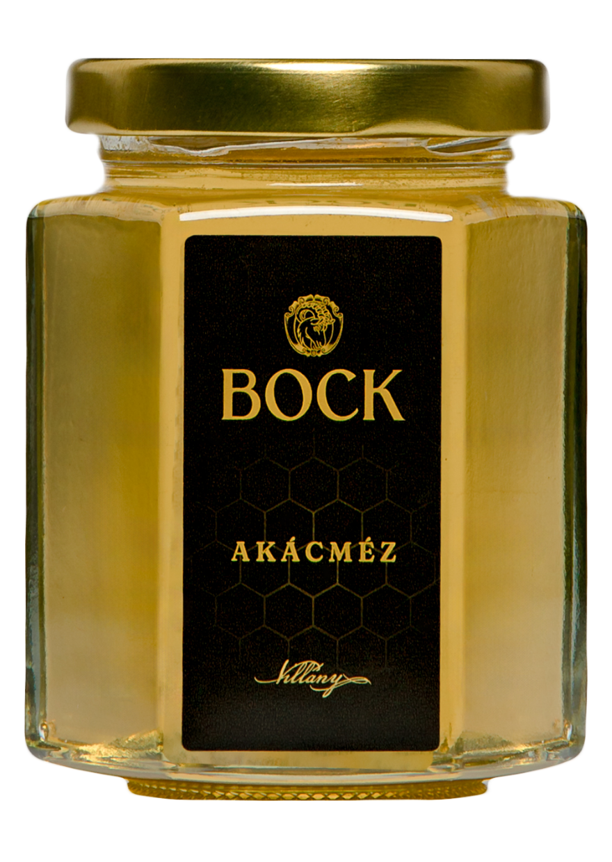 Glass jar of acacia honey with a black label reading 'BOCK' in gold lettering and a gold lid.